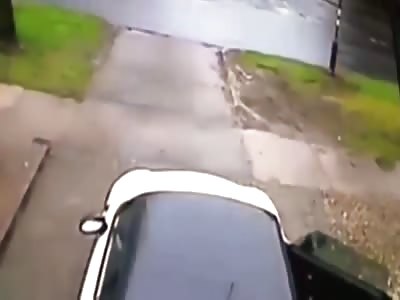 Carjacker drags woman into traffic.