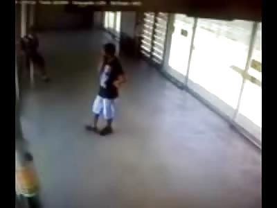 Tall Lanky Man Shoots Much Shorter Dude Wiping his Face with his Shirt