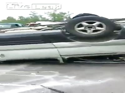 Expressway accident, Family Van Flips over 
