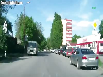Schoolboy Crossing the Road Hit by a Car 