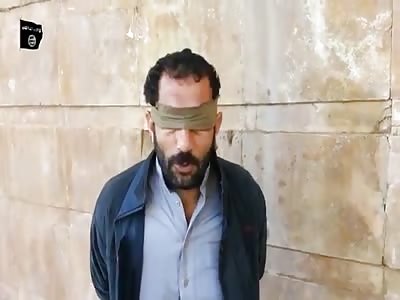 ISIS Shoot a Blindfolded Man in the Head by the River (Head Explodes) 