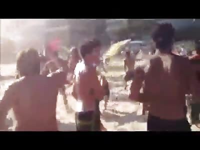 *BRAZIL* (WTF) Beach security guards vs. VICIOUS crowd = Beach Chairs, Punches and Coconuts FLYING EVERYWHERE! LOL