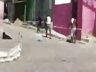 *Brazil* Guy with a machete  VS.  guy with a big stick