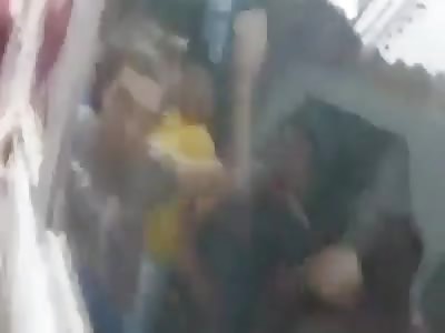 *Brazil* Sissy bus robber caught and left with a bloodied face