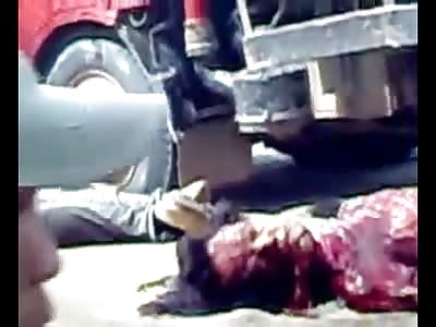 Truck runs over and kills 2 people