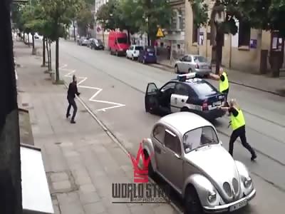 Guy with a death wish throws stick at cops 