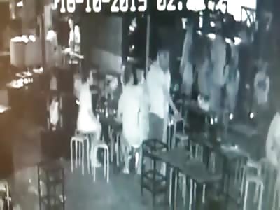 MAN HITS WOMAN WITH BOTTLE ON HEAD