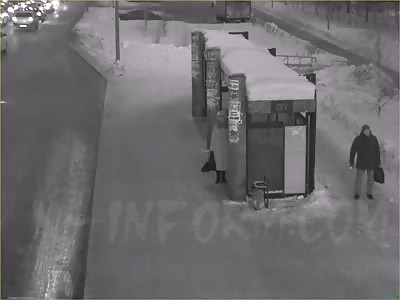 RUNAWAY CAR HITS ELDERLY WOMAN IN BUS STOP