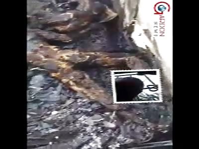 DEAD PEOPLE IN A BURNED BUILDING