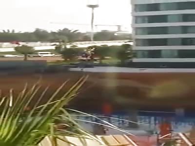 COW SACRIFICED HUNG ON CRANE AND BLOOD SPREAD IN THE FOUNDATIONS OF A NEW BUILDING