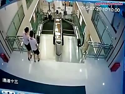 OMG - WOMAN DIES SWALLOWED BY ESCALATOR