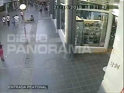 MAN KICKS THE HEAD OF A STREET VENDOR