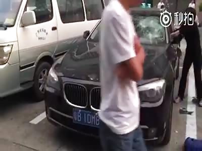 EX WOMAN DESTROYS BMW THAT MAN USED TO STROLL AROUND WITH NEW GIRLFRIEND