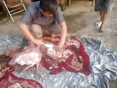 MAN BUTCHERING A TIGER!