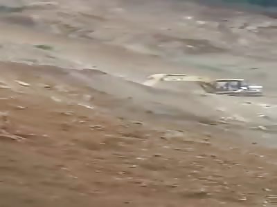 TWO DEAD IN A LANDSLIDE