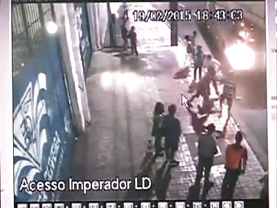 MAN IS PUSHED DOWN TO BUS