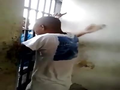 PRISONER TAKING A BEATING