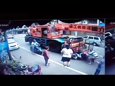 WOMAN NARROWLY ESCAPED CRANE CRUSHED TO DEATH