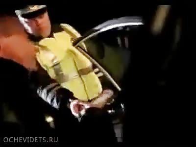 Car cam of Wolves and cop.