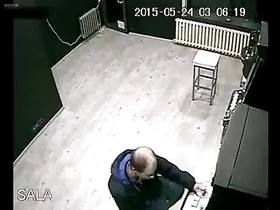 Man having a shit time at slot machine arcade 