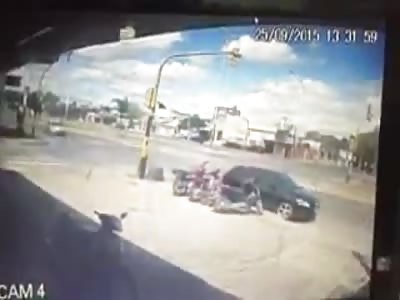 Motorcycle rider crashes hard into car 