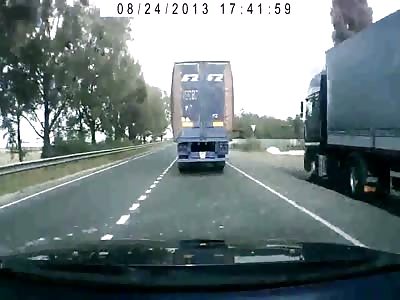 Head on Collision Between Car and Semi Truck 