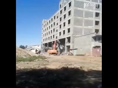 Excavator Driver Killed in Building Collapse