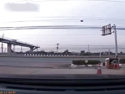 Truck hits bulletin board and bulletin board fall on the motorcycle driver. 