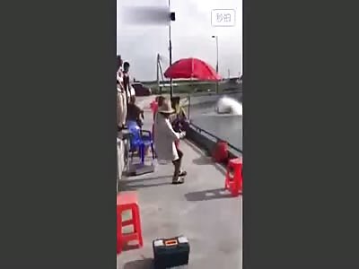 Old man struggles with big fish