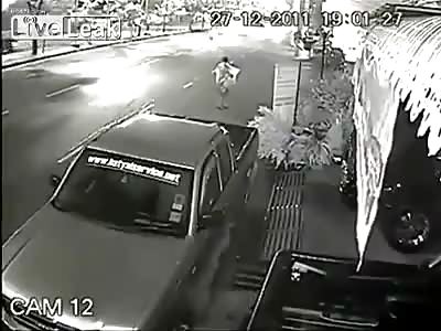 Pedestrian hit by motorcycle and other cars run over him