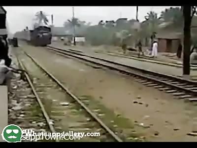 Horrible train accident .. Man standing on top of the train hit the over bridge 