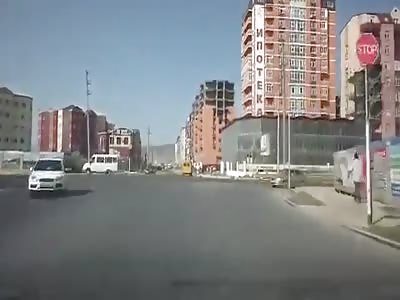 Lady in green dress ejected from car 