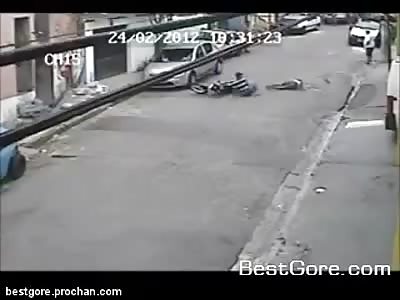 Two Idiots on a Motorcycle Go Over a Speedbump