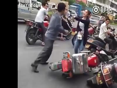 Man punches woman in head over traffic Dispute. 