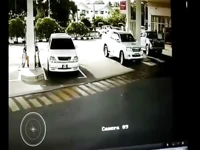 Car Theft from Gas Station with Owner Clinging to Rear - CCTV 