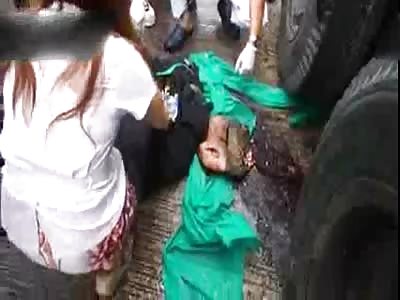 Man head crushed underneath truck