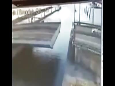 Car Nose Dives Off Open Bridge in Netherlands