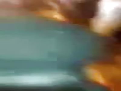 Crappy video of  stoned and dragged by the feet