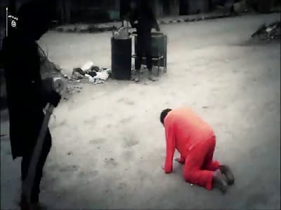 ISIS Behead Three Men with Sword