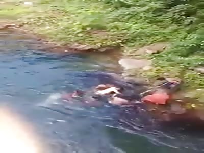 People Carrying the Body of a Drowned Man from the River