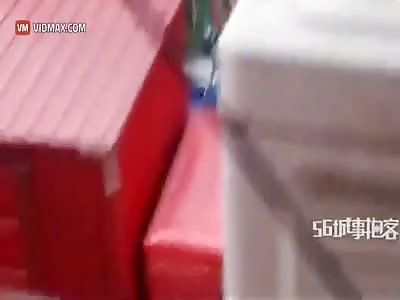 Chinese man brutally beating his wife gets a dose of street justice, Wife STILL protects him