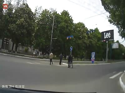 Ukrainian army tank loses control on the road, takes out billboard and almost killing drivers