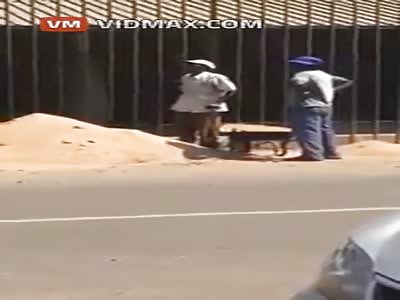 Posibly the dumbest two workers ever. It really is baffling how stupid this is.