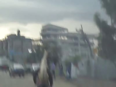 Wait What!? Is That a Goat Riding On The Back Of a Man Riding a Bike..?